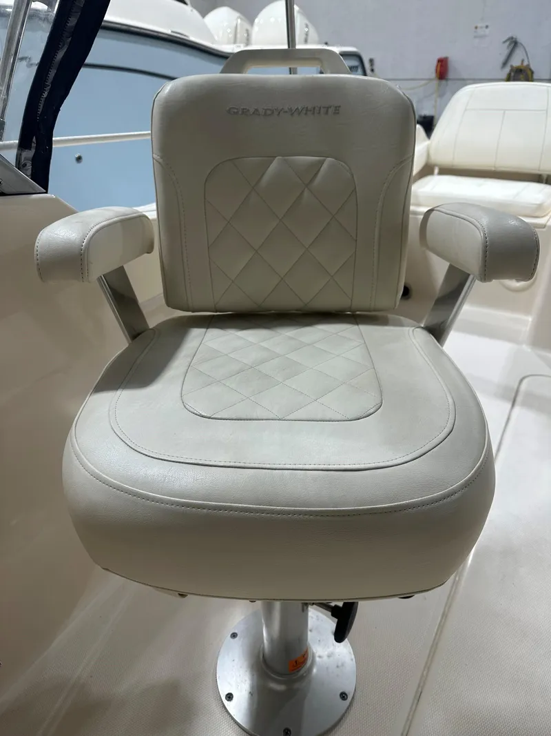 Slide: The Image of Grady-White 215 Freedom 2020 boat seat with diamond-pattern upholstery. - 6