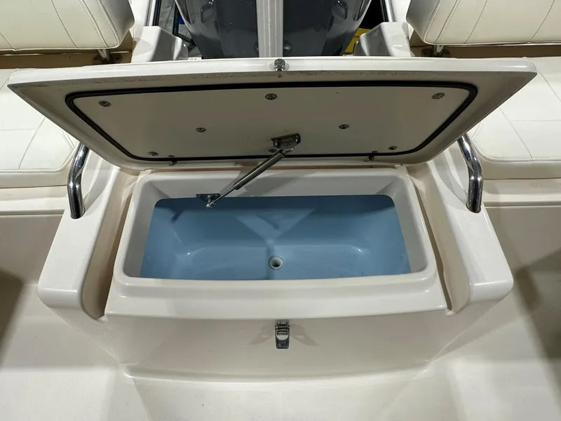 Slide: The Image of Open storage compartment on 2020 Grady-White 215 Freedom boat. - 8