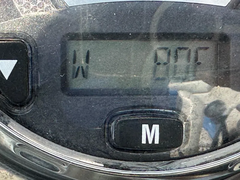 Slide: The Image of Close-up of 2010 Nautique Sport Nautique 226 digital display with buttons. - 10