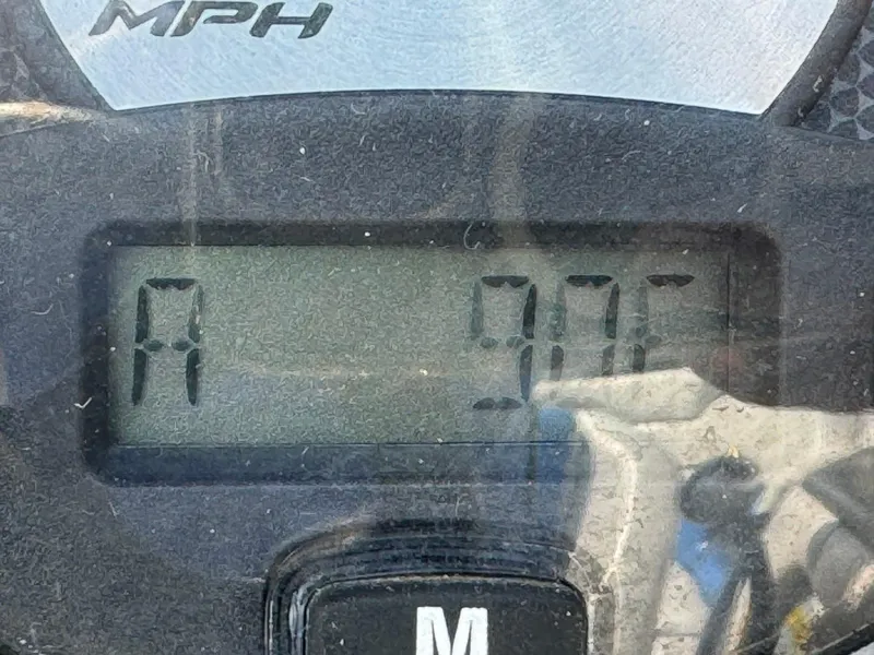 Slide: The Image of Close-up of 2010 Nautique Sport Nautique 226 speedometer displaying 9.0 MPH. - 11