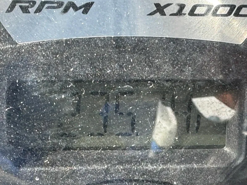 Slide: The Image of Close-up of a 2010 Nautique Sport Nautique 226 RPM gauge displaying 3510 RPM. - 12