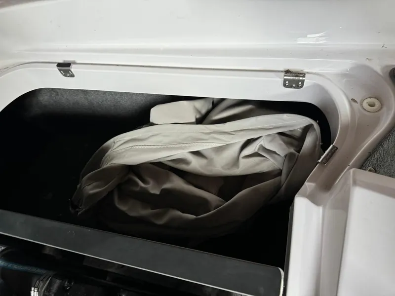 Slide: The Image of Storage compartment in 2010 Nautique Sport Nautique 226 boat. - 14