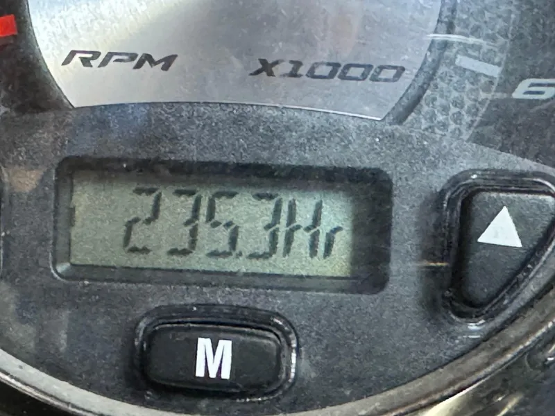 Slide: The Image of Close-up of 2010 Nautique Sport Nautique 226 hour meter displaying 2353 hours. - 20