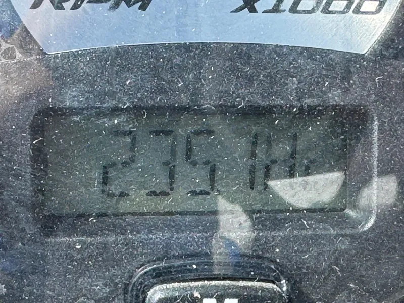 Slide: The Image of Close-up of 2010 Nautique Sport Nautique 226 RPM gauge displaying 2.35 hours. - 8