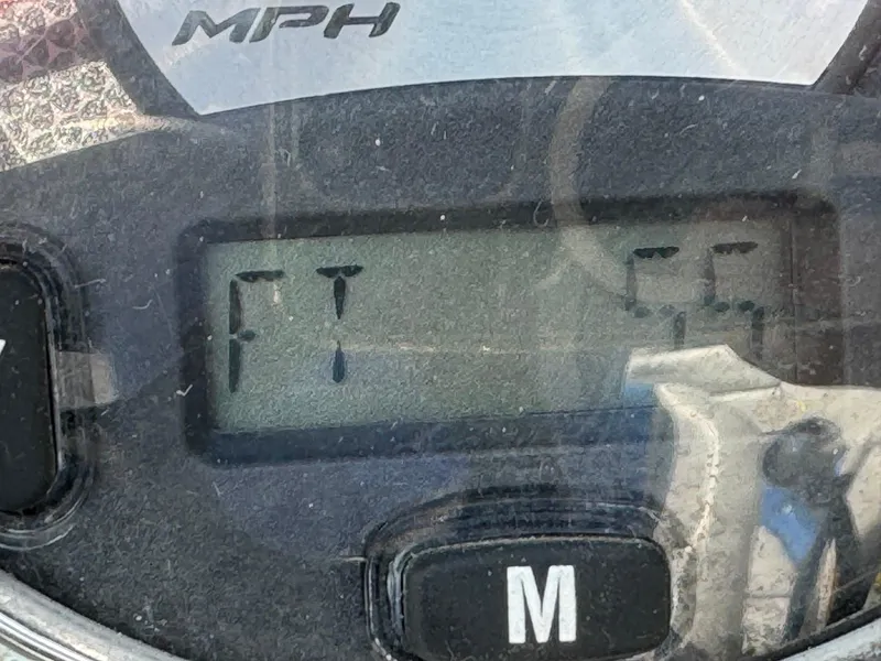 Slide: The Image of Close-up of 2010 Nautique Sport Nautique 226 speedometer displaying "FT" and "55". - 9