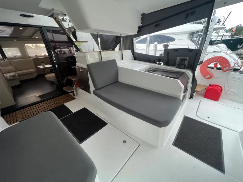 Slide: The Image of Modern kitchen area in 2022 Fountaine Pajot Aura 51 yacht with sleek cabinetry. - 12