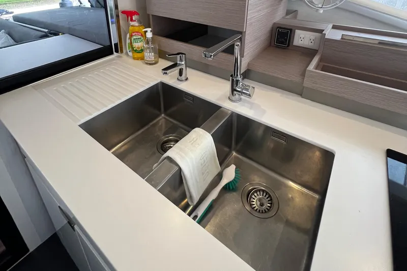 Slide: The Image of Luxurious bedroom interior of 2022 Fountaine Pajot Aura 51 yacht with modern furnishings. - 16