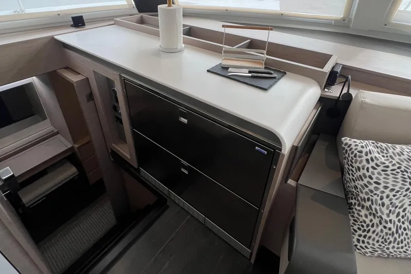 Slide: The Image of Modern interior of 2022 Fountaine Pajot Aura 51 yacht, featuring sleek design and comfortable seating. - 20