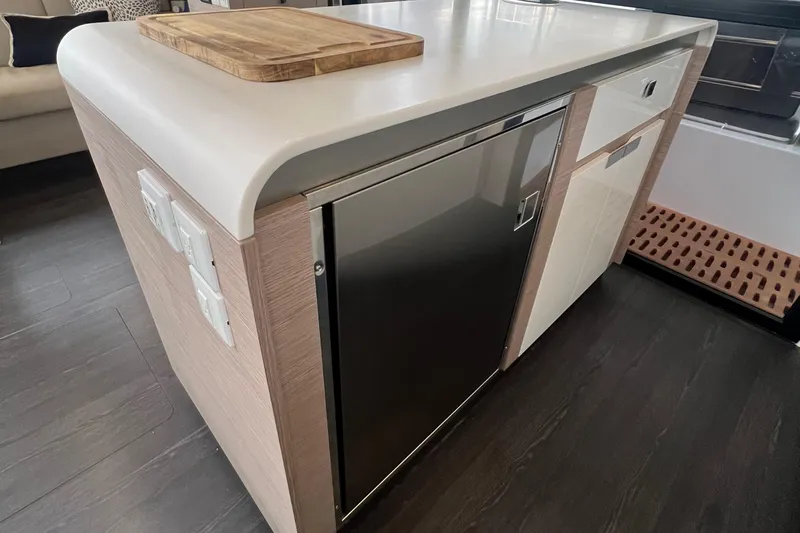 Slide: The Image of Luxurious interior of 2022 Fountaine Pajot Aura 51 catamaran, featuring modern design and cozy seating. - 23