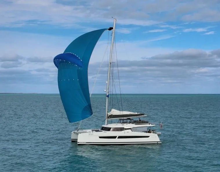 Slide: The Image of Floor plan of 2022 Fountaine Pajot Aura 51 catamaran, showcasing cabin layout and amenities. - 3