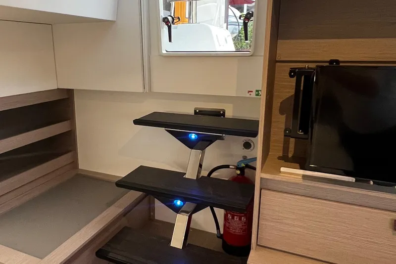 Slide: The Image of Luxurious bedroom interior of 2022 Fountaine Pajot Aura 51 yacht, featuring elegant bedding. - 34