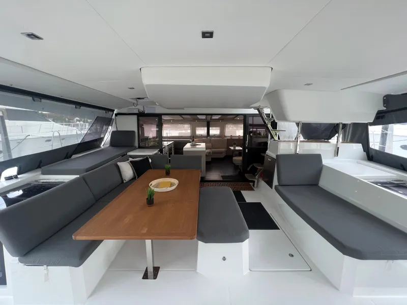 Slide: The Image of Modern kitchen interior of 2022 Fountaine Pajot Aura 51 yacht, featuring sleek design and appliances. - 8