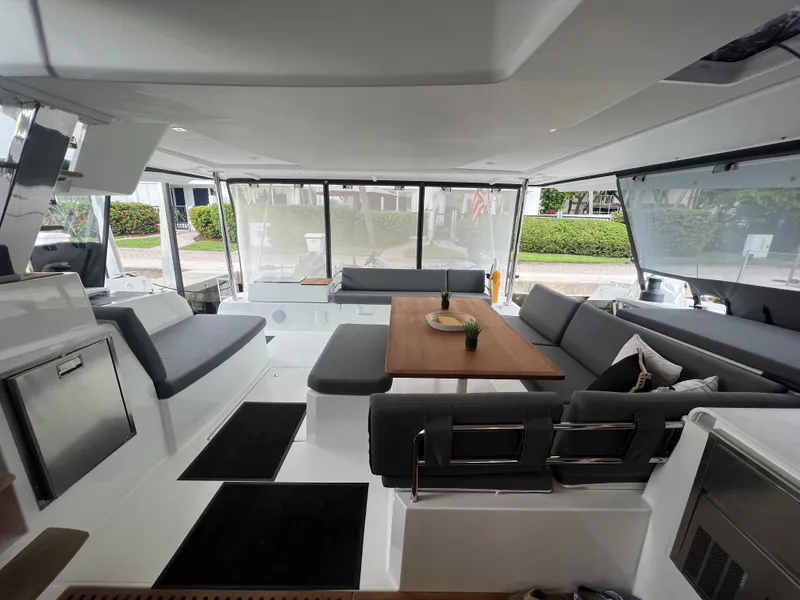 Slide: The Image of Whirlpool induction cooktop with sleek black glass surface and touch controls. - 11