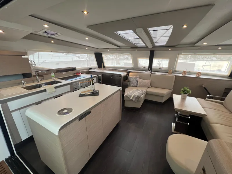 Slide: The Image of Luxurious bedroom interior of 2022 Fountaine Pajot Aura 51 yacht, featuring modern design and cozy bedding. - 18