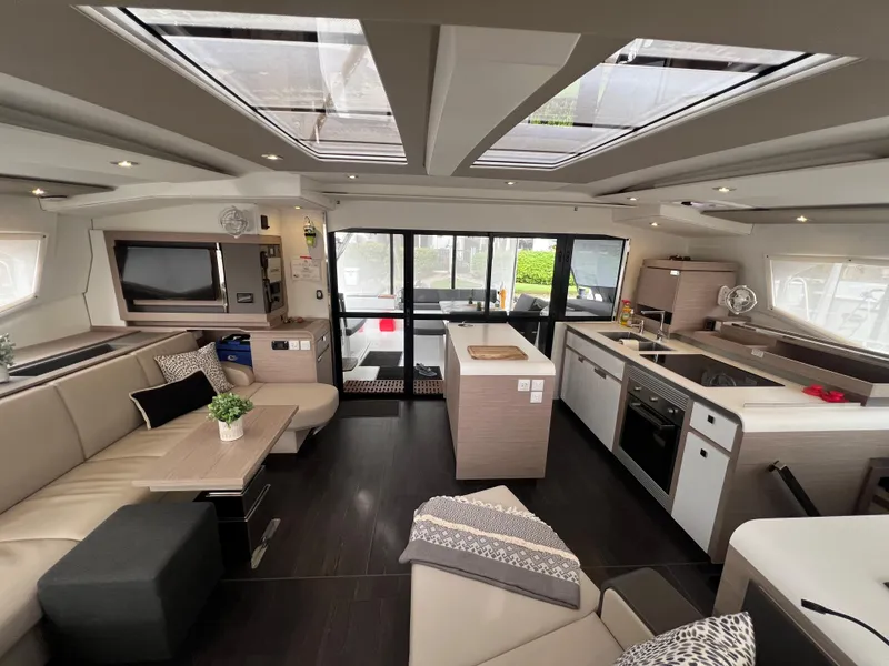 Slide: The Image of Luxurious interior of 2022 Fountaine Pajot Aura 51 yacht cabin with modern furnishings. - 19
