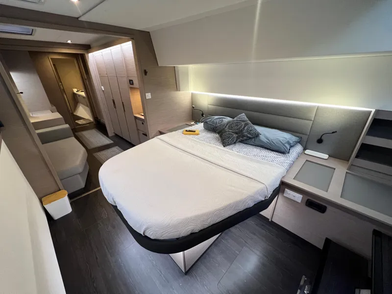 Slide: The Image of Luxurious bedroom interior of 2022 Fountaine Pajot Aura 51 yacht, featuring modern design and cozy ambiance. - 33