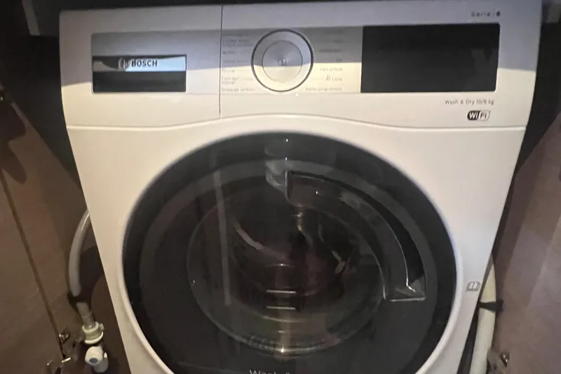 Slide: The Image of Safety equipment on 2022 Fountaine Pajot Aura 51 yacht, featuring a rescue sling and buoy. - 53