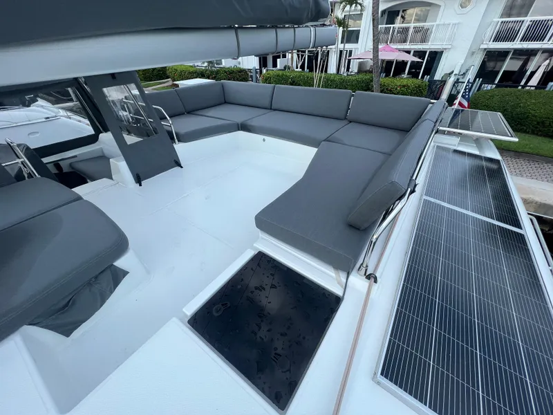 Slide: The Image of Luxurious interior of 2022 Fountaine Pajot Aura 51 catamaran with modern seating and decor. - 7