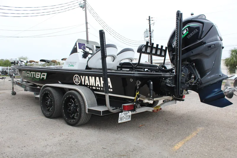 Slide: The Image of 2023 Mamba 227VX boat with Minn Kota trolling motor on trailer. - 10