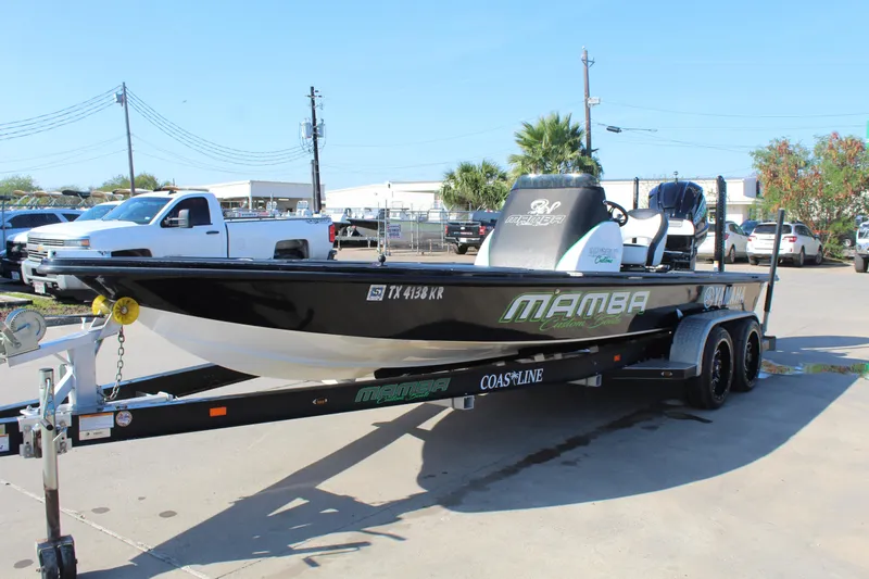 Slide: The Image of 2023 Mamba 227VX boat rear view with powerful outboard motor. - 3
