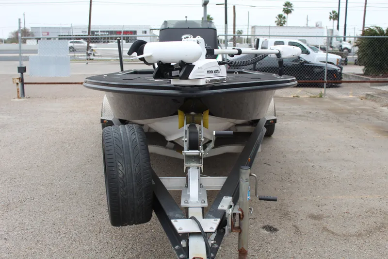 Slide: The Image of 2023 Mamba 227VX boat dashboard with steering wheel and control panel. - 5