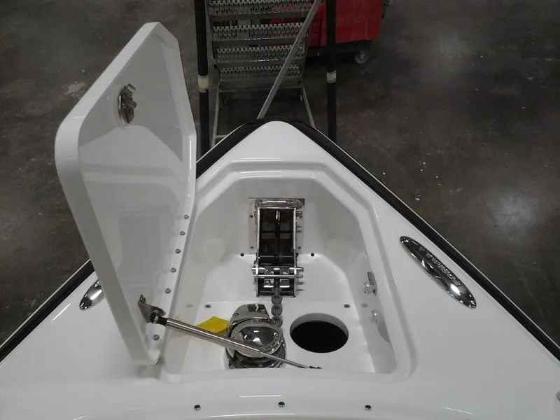 Slide: The Image of Open anchor compartment on 2016 Formula 290 Bowrider boat. - 12