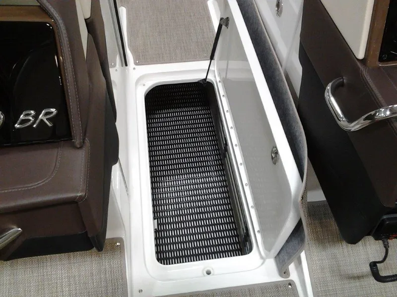 Slide: The Image of Open storage compartment in 2016 Formula 290 Bowrider boat interior. - 15