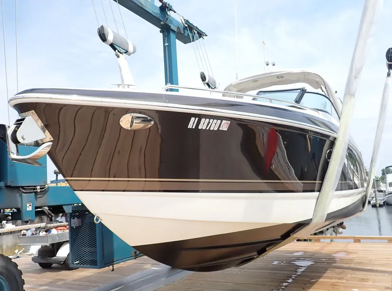 Slide: The Image of 2016 Formula 290 Bowrider boat on lift at marina. - 21