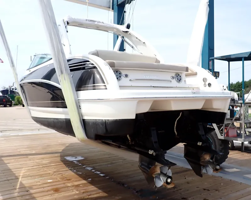 Slide: The Image of 2016 Formula 290 Bowrider boat on lift at marina dock. - 22