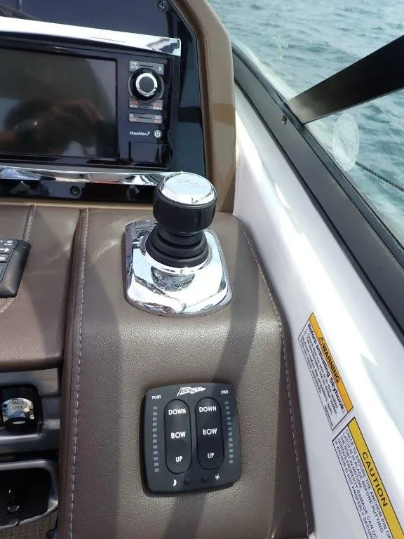 Slide: The Image of 2016 Formula 290 Bowrider control panel with joystick and navigation system. - 24