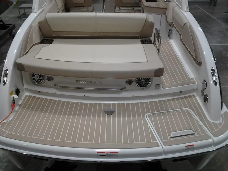 Slide: The Image of 2016 Formula 290 Bowrider boat with spacious seating and sleek design. - 3