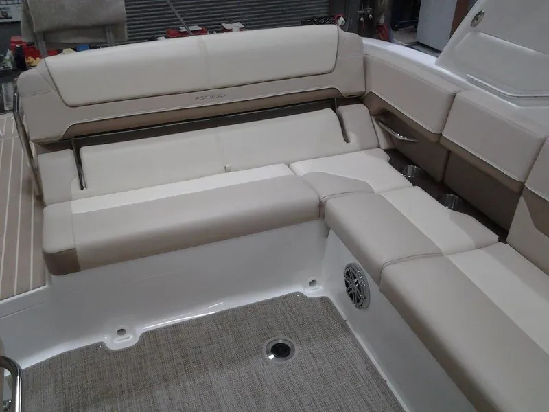 Slide: The Image of 2016 Formula 290 Bowrider interior with beige seating and carpeted floor. - 6