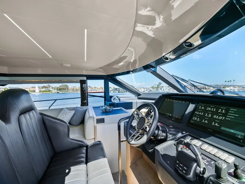 Slide: The Image of Luxurious 2021 Absolute 50 Fly yacht interior with modern helm and waterfront view. - 36
