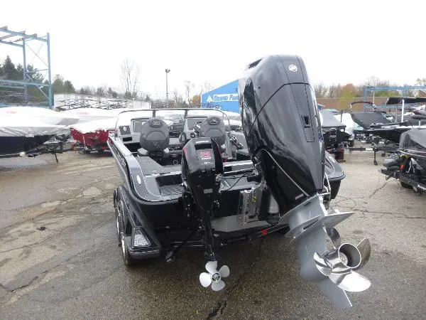 Slide: The Image of 2025 Ranger 622FS Pro boat with powerful outboard motor, displayed in a dealership lot. - 10