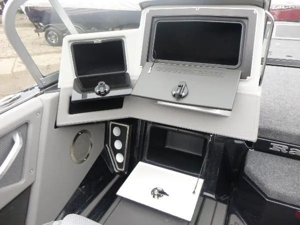 Slide: The Image of 2025 Ranger 622FS Pro dashboard with storage compartments and sleek design. - 28