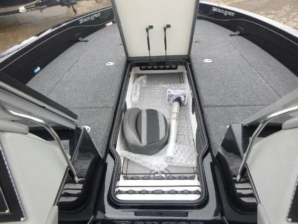 Slide: The Image of 2025 Ranger 622FS Pro boat interior with open storage compartments. - 31