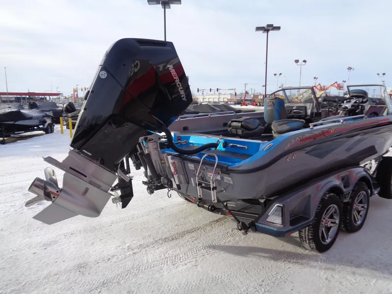 Slide: The Image of 2025 Ranger 621FS Cup Equipped boat with powerful outboard motor in snowy setting. - 3