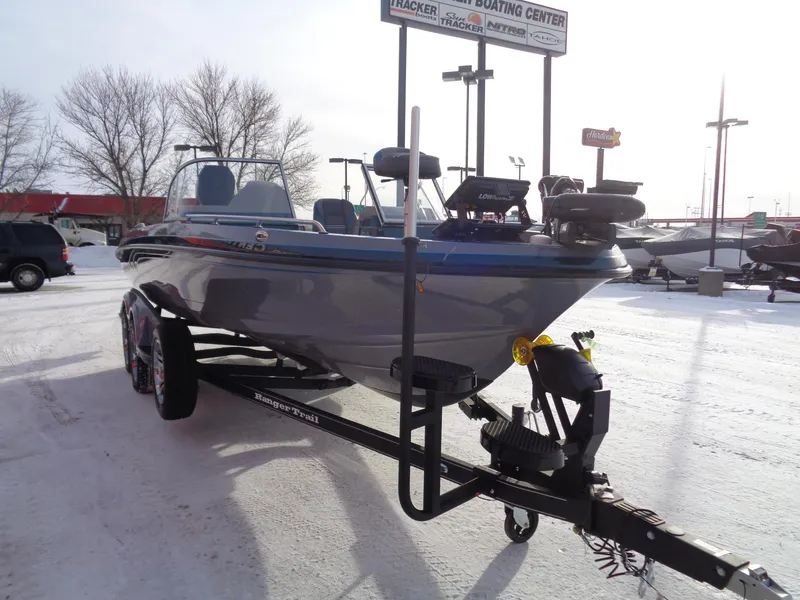 Slide: The Image of 2025 Ranger 621FS Cup Equipped boat on trailer in snowy dealership lot. - 7