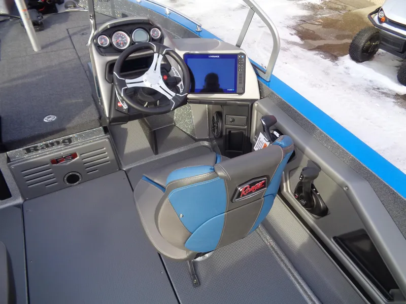 Slide: The Image of 2025 Ranger 621FS Cup Equipped boat interior with steering wheel and navigation display. - 9