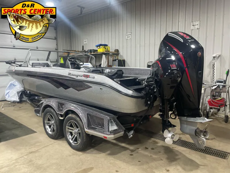 Slide: The Image of 2025 Ranger 621FS Cup Equipped boat in showroom, featuring sleek design and powerful engine. - 2