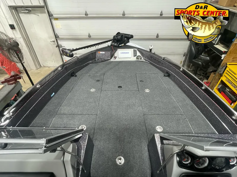 Slide: The Image of 2025 Ranger 621FS Cup Equipped boat deck in garage, featuring D&R Sports Center logo. - 7