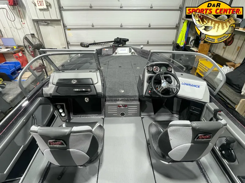 Slide: The Image of Interior of 2025 Ranger 621FS Cup Equipped boat with dual seats and control panel. - 8