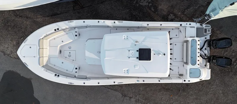 Slide: The Image of Aerial view of 2022 Sea Fox 328 boat, showcasing spacious deck and dual engines. - 11