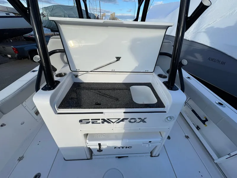 Slide: The Image of Sea Fox 328 boat interior with open storage compartment, 2022 model. - 16