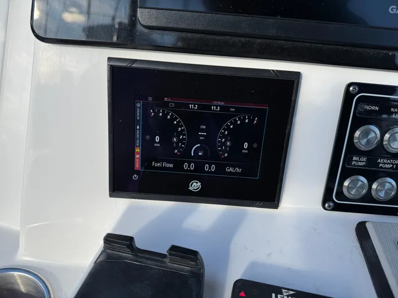Slide: The Image of Dashboard of 2022 Sea Fox 328 boat with digital display and controls. - 20