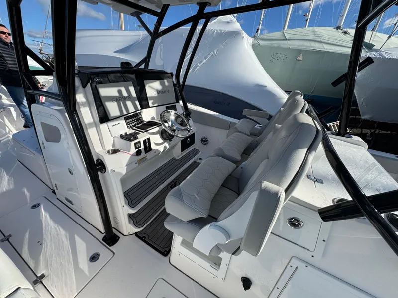Slide: The Image of 2022 Sea Fox 328 boat interior with modern helm and seating. - 38