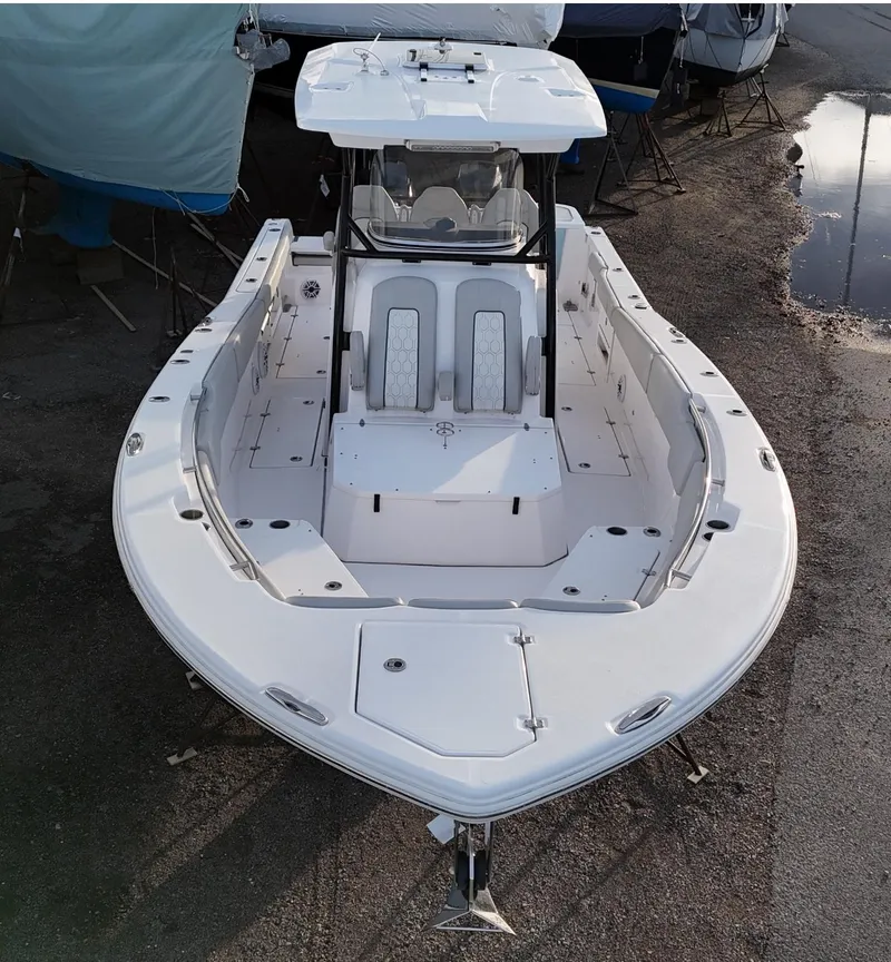 Slide: The Image of 2022 Sea Fox 328 boat, white, docked, aerial view, spacious deck, modern design. - 4