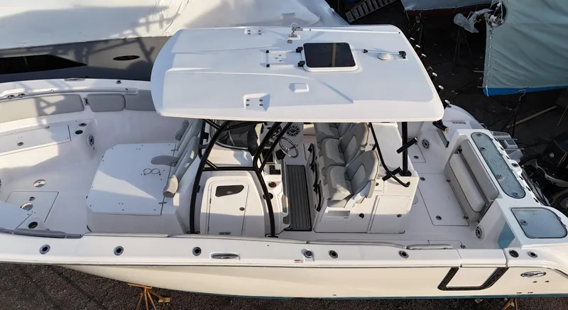 Slide: The Image of 2022 Sea Fox 328 boat, aerial view, spacious deck and seating. - 6