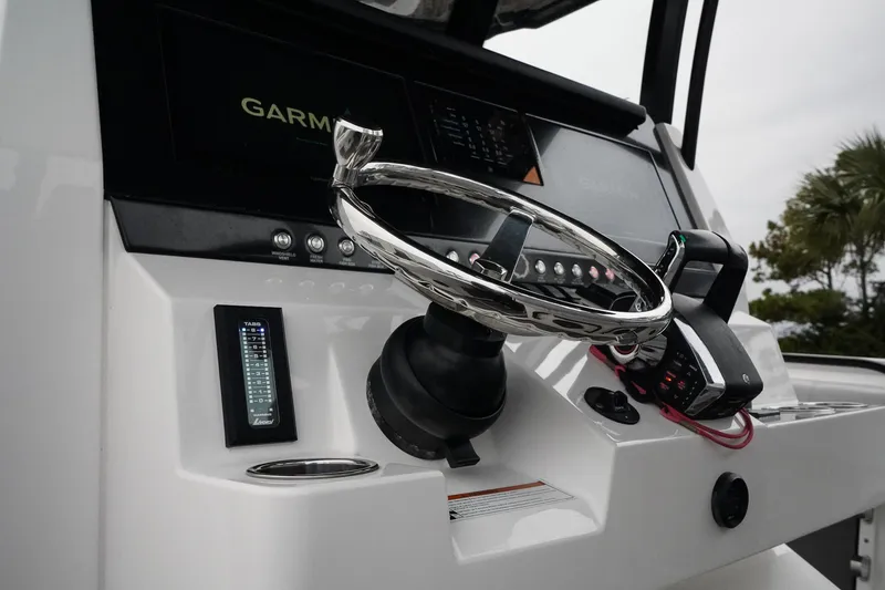 Slide: The Image of 2023 Fountain Bluewater 38 Tournament Edition helm with Garmin navigation system. - 27