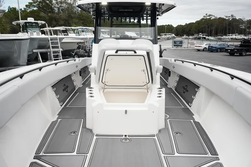 Slide: The Image of 2023 Fountain Bluewater 38 Tournament Edition boat interior with open storage compartment. - 40
